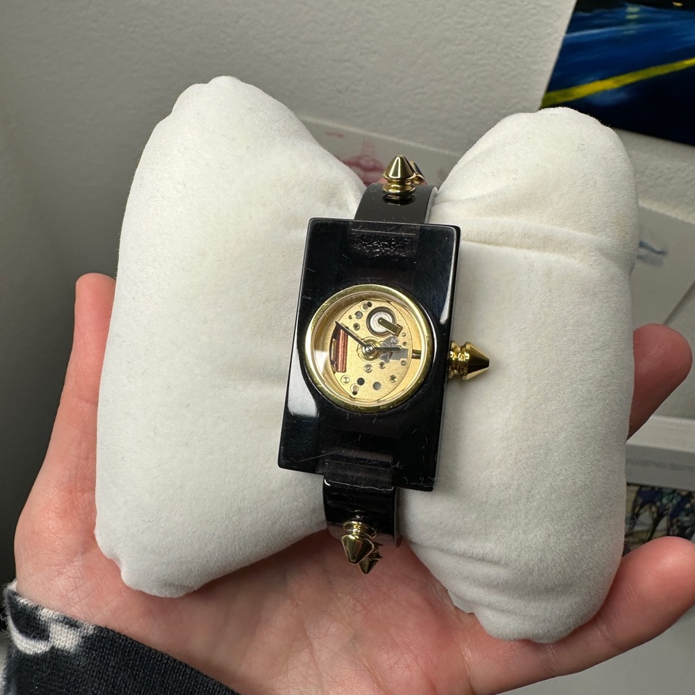 Gucci Black and Gold Watch